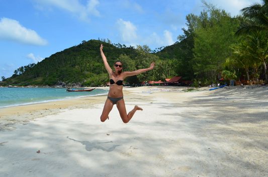 crazy sexy fun traveler on Bottle beach on Koh Phangan in Thailand