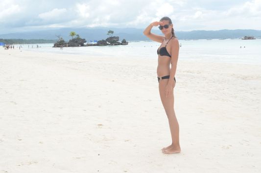 crazy sexy fun traveler on White beach on Boracay