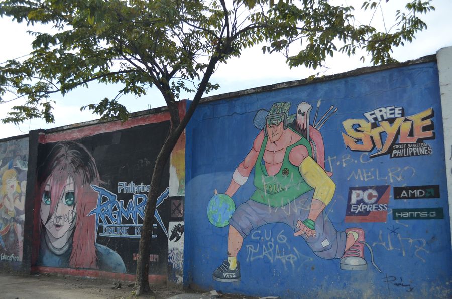 graffiti wall around Queen City