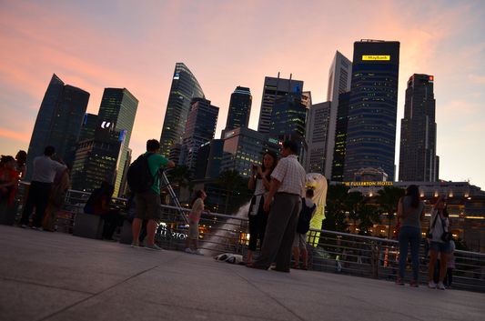 sunset above Marina Bay skyscrapers in Singapore