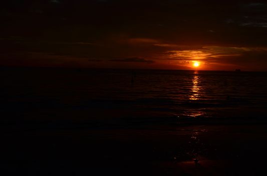 sunset at Pantai Cenang on Langkawi island in Malaysia
