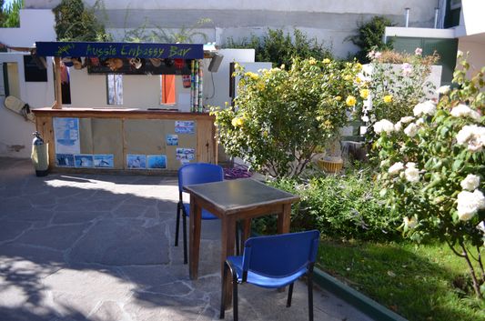 garden bar during the day in Hi Patagonia Hostel