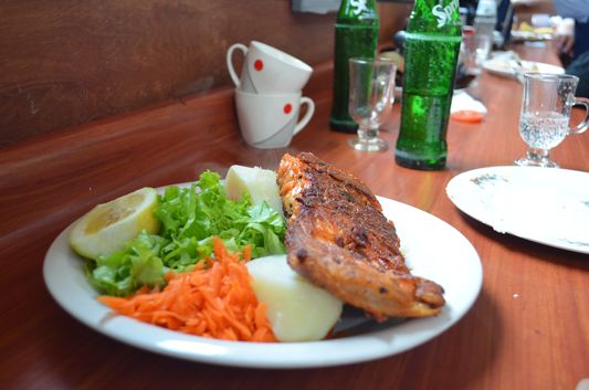eating salmon in Dalcahue feria de artesanias