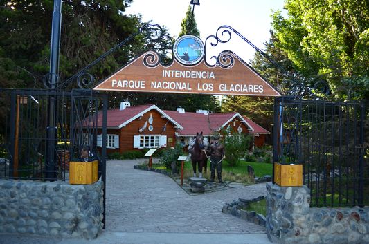 inside Intendencia Parque Nacional de los Glaciares with Francisco Moreno statue - me and Lyra