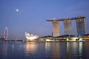 full moon above Marina Bay Sands Hotel, Science Museum and Singapore Flyer