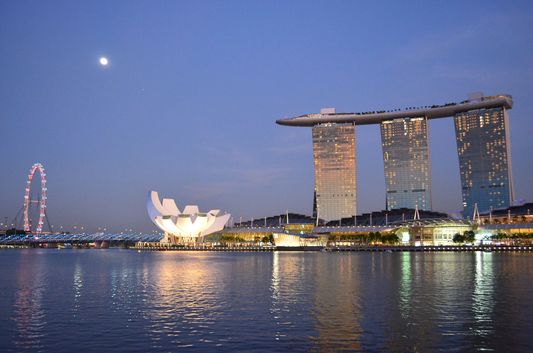 full moon above Marina Bay Sands Hotel, Science Museum and Singapore Flyer