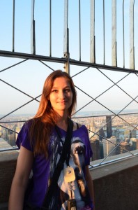 crazy sexy fun traveler on top of the 86th floor of the Empire State Building
