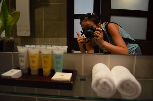 free toiletries in Library Hotel and my reflection in the mirror