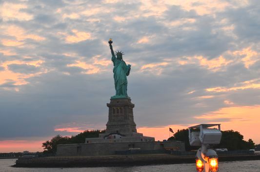 the Statue of Liberty at sunset seen from Circle Line Cruise with CityPASS