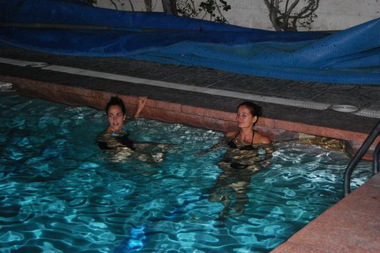 Crazy sexy fun traveler and Sandra swimming in Balneari Prats