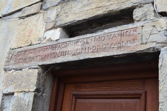 Latin monograms on the houses in Pigna
