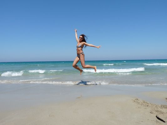 jumping at Torre Guaceto beach