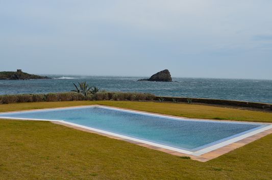 unusually shaped swimming pool at Sa Costa villa