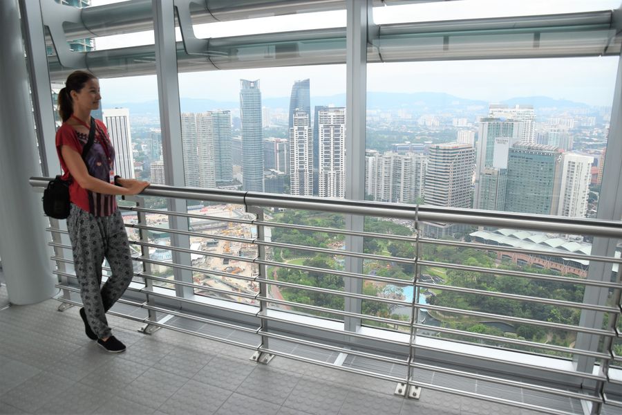 Using top trip tech apps for travelers to find things to do around me, such as the Petronas Towers in Kuala Lumpur