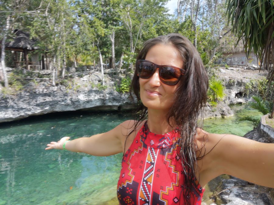 crazy sexy fun traveler in cenote Santa Cruz Tulum
