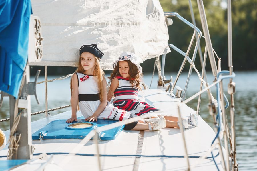 The children on board of sea yacht