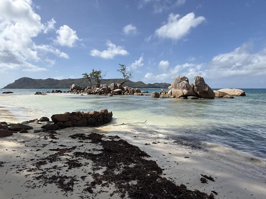 Smoon Island and Dolphin rock Praslin from Anse Takamaka